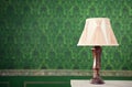 Vintage lamp on fireplace on retro pattern background Royalty Free Stock Photo