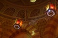 Vintage lamp lanterns hanging on ceiling of medieval castle