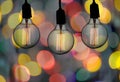 Vintage lamp or Modern Light bulb hang on ceiling in bokeh background. Royalty Free Stock Photo