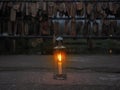 Vintage lamp on street over wood name plates and tied to the bridge rail background Royalty Free Stock Photo