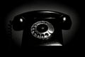 Vintage landline telephone with a handset in black and white. Royalty Free Stock Photo