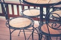 Vintage lantern with chairs and tables, outdoor cafe. Royalty Free Stock Photo