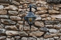 Vintage lantern on an old stone wall Royalty Free Stock Photo