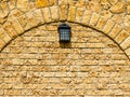 Vintage lantern on an old wall Royalty Free Stock Photo