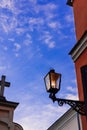 Vintage lantern old street style decoration with electricity lighting and blue sky background vertical picture concept photography