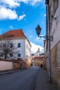 vintage lanterns on narrow streets overlooking the temple of old Vilnius