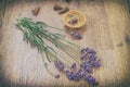 Vintage lavender flowers and incense aroma cones on a wooden table Royalty Free Stock Photo