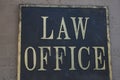 Vintage Law Office Sign on Wall of Downtown Building Royalty Free Stock Photo