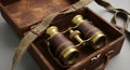 Vintage leather binoculars and case with strap, evoking exploration and historical adventure Royalty Free Stock Photo