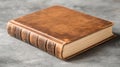 Vintage Leather Bound Book On Gray Surface Royalty Free Stock Photo