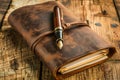 Vintage Leather Bound Journal with Elegant Fountain Pen on Rustic Wooden Table Desk Antique Personal Diary or Notebook Concept Royalty Free Stock Photo