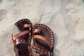 Vintage leather sandals handmade on the sand. Nobody Royalty Free Stock Photo