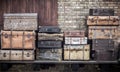 Vintage leather suitcases stacked vertically - Spreewald, Germany.