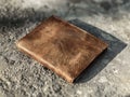 Vintage leather wallet on textured background Royalty Free Stock Photo