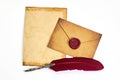 Vintage Letter Set. A parchment, sealed envelope, and quill evoke an old-world charm. Royalty Free Stock Photo