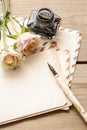 Vintage letters, roses and bottle of ink Royalty Free Stock Photo