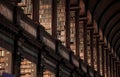 Vintage library with shelves of old books in the Long Room in the Trinity College. Dublin, Ireland - Feb 15, 2014