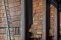 Vintage library with shelves of old books in the Long Room in the Trinity College Royalty Free Stock Photo