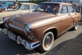 Vintage light brown colour car GAZ-21 Volga. General view