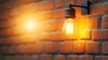 Vintage Light Bulb Hanging on Brick Wall Creating Warm and Inviting Atmosphere Royalty Free Stock Photo