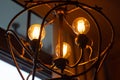 Vintage light bulbs in an ancient chandelier Royalty Free Stock Photo