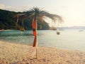 Vintage light effected: Beach umbrella exotic decoration with coconut tree