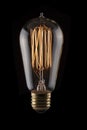 Vintage Lightbulb on Black Background