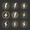 Vintage lightning bolt and sunrays. Lightnings with crumpled paper texture and sunburst effect. Thunderbolt, electric