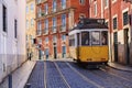 Vintage Lisbon tram on city street