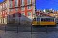 Vintage Lisbon tram on city street Royalty Free Stock Photo