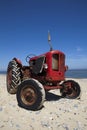 Vintage little red beach tractor Royalty Free Stock Photo