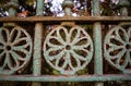 Old wrought iron fence. Vintage look. Detail of an ornament Royalty Free Stock Photo