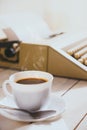 Vintage looking coffee and typing machine on a desk