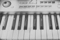 Vintage looking Detail of black and white keys on music keyboard