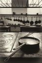Antique XIX century old kitchen with tools, pans, pots and food ingredients Royalty Free Stock Photo