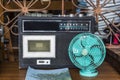 Vintage looking table fan and retro cassette player
