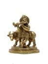 vintage lord krishna statue playing flute beside a cow Royalty Free Stock Photo