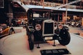 Vintage luxury car parked in a showroom in Brussels, Belgium.