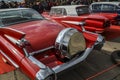 Vintage luxury red car Cadillac DeVille 1959 is presented at the retro car festival in Kyiv