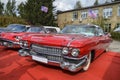 Vintage luxury red car Cadillac DeVille 1959 is presented at the retro car festival in Kyiv