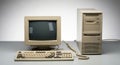 Vintage macintosh computer system from the early computing era displayed together Royalty Free Stock Photo