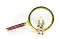 Vintage magnify glass with oldman toy model