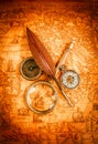 Vintage magnifying glass lies on an ancient world map Royalty Free Stock Photo