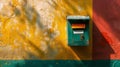 Vintage mailbox on a colorful textured wall Royalty Free Stock Photo