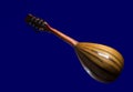 Vintage mandolin isolated on a deep blue background. Back view Royalty Free Stock Photo