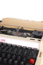 Vintage manual typewriter, with sheet of aged notepaper providing copy space