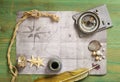 Vintage map and accessories for the treasure hunt Royalty Free Stock Photo