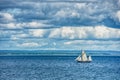 Vintage 3 mast big sailing vessel at sea on a murky day. The old sailing ship in the ocean conveys a sense of adventure, discovery Royalty Free Stock Photo