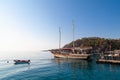 Vintage mast wooden sailing ship for sea tours. Touristic pirate ship in port. Marina in in resort city Kemer, Turkey. Old harbour Royalty Free Stock Photo