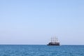 Vintage mast wooden sailing ship for sea tours. Touristic pirate ship in port. Marina in in resort city Kemer, Turkey. Old harbour Royalty Free Stock Photo